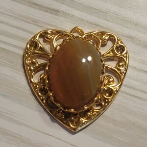 R8 Gold-tone Banded Onyx Heart Pendant